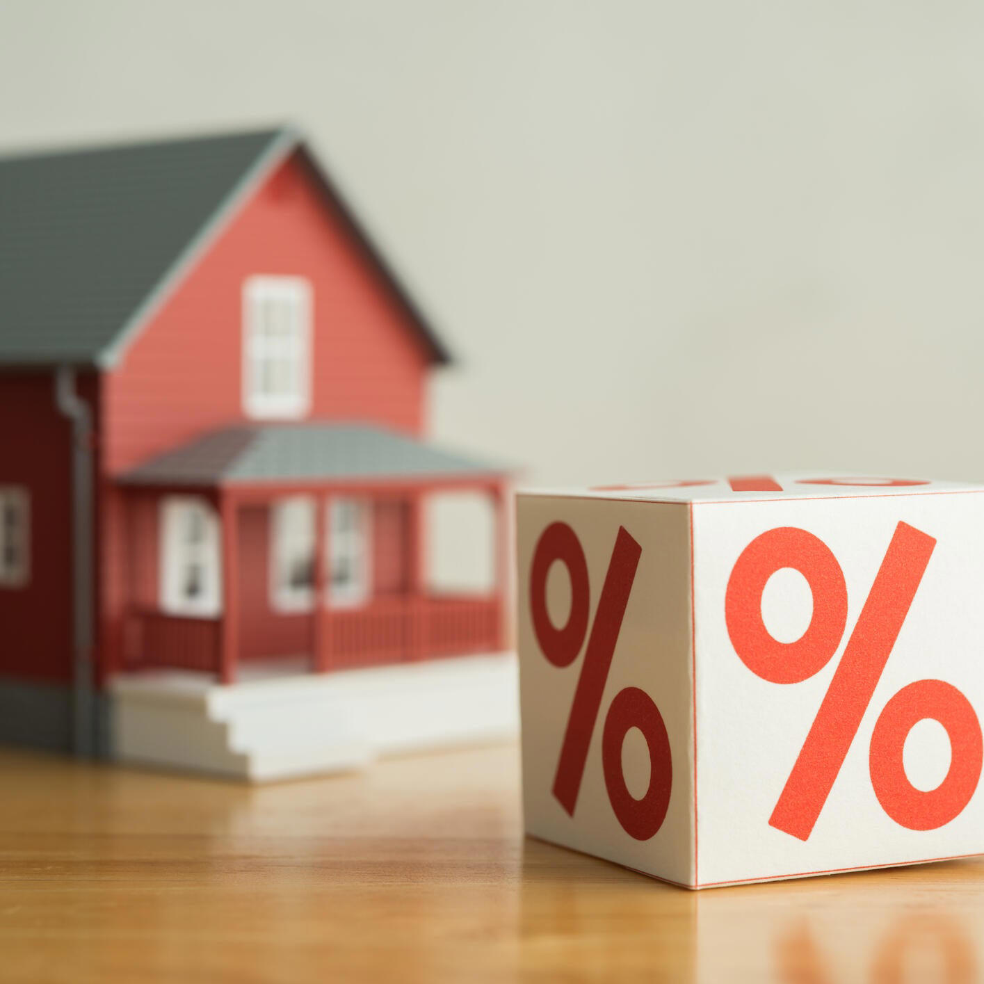 Model home next to interest rate blocks